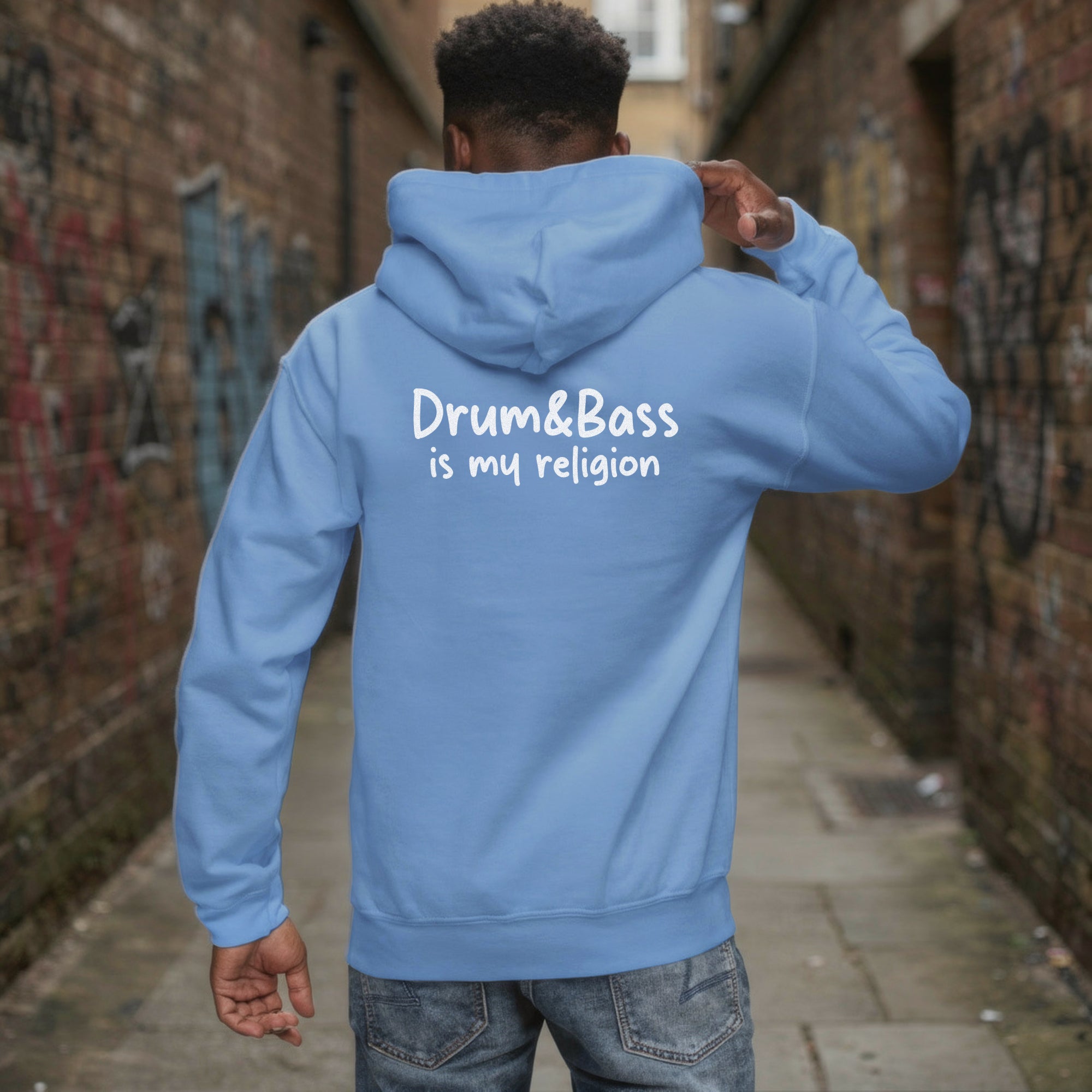 unisex hoodie with bold, colourful geometric illustration of Funky Jaysus on front and “Drum&Bass is my religion” slogan on back. A statement streetwear piece for DnB lovers and festival culture.'