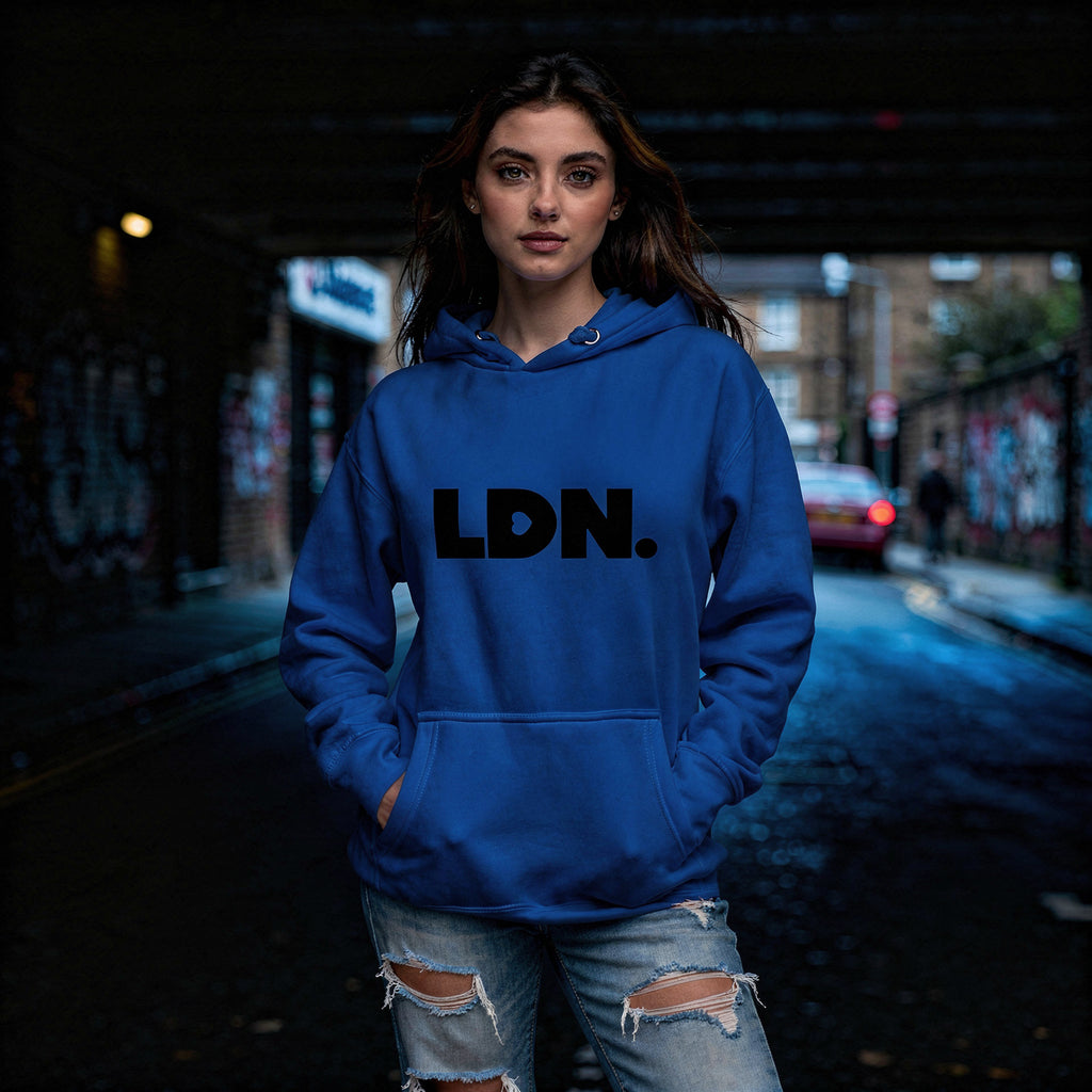 Unisex Hoodie - blue hoodie with tonal “LDN.” graphic worn by male model — soft fleece lining, relaxed streetwear silhouette, perfect for layering in cooler seasons.