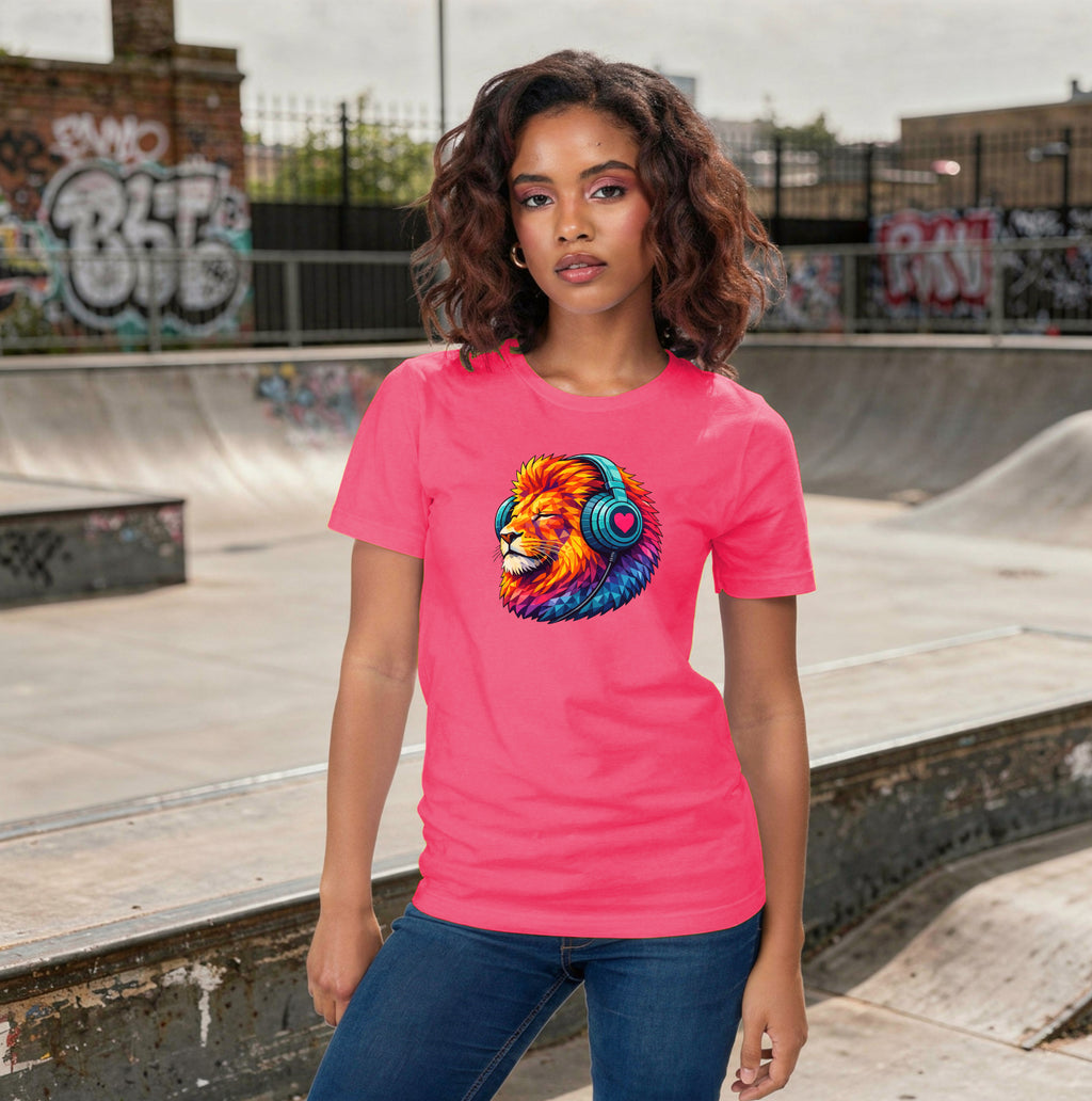 Person wearing a t-shirt with a colourful lion graphic, standing in a skateboard park