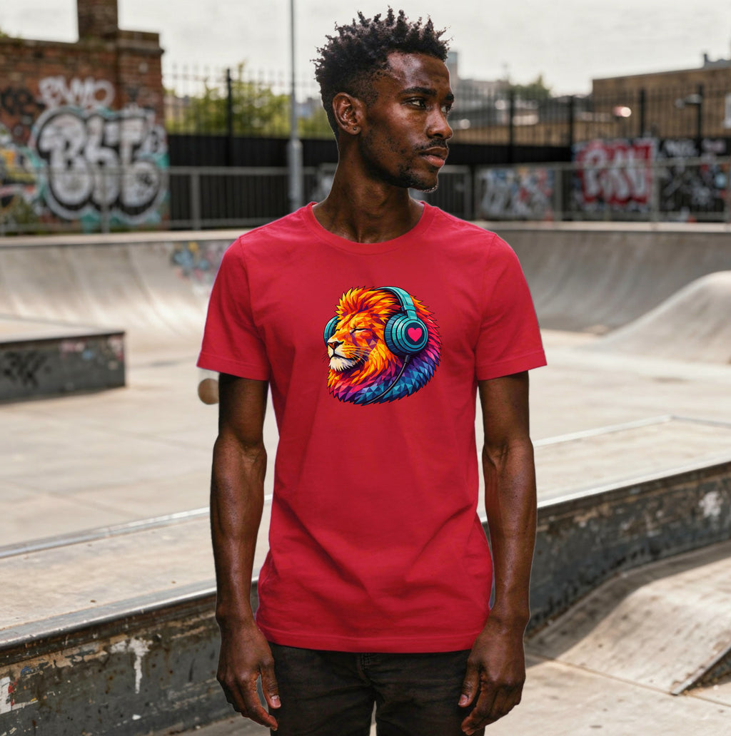 Person wearing a t-shirt with a colourful lion graphic, standing in a skateboard park
