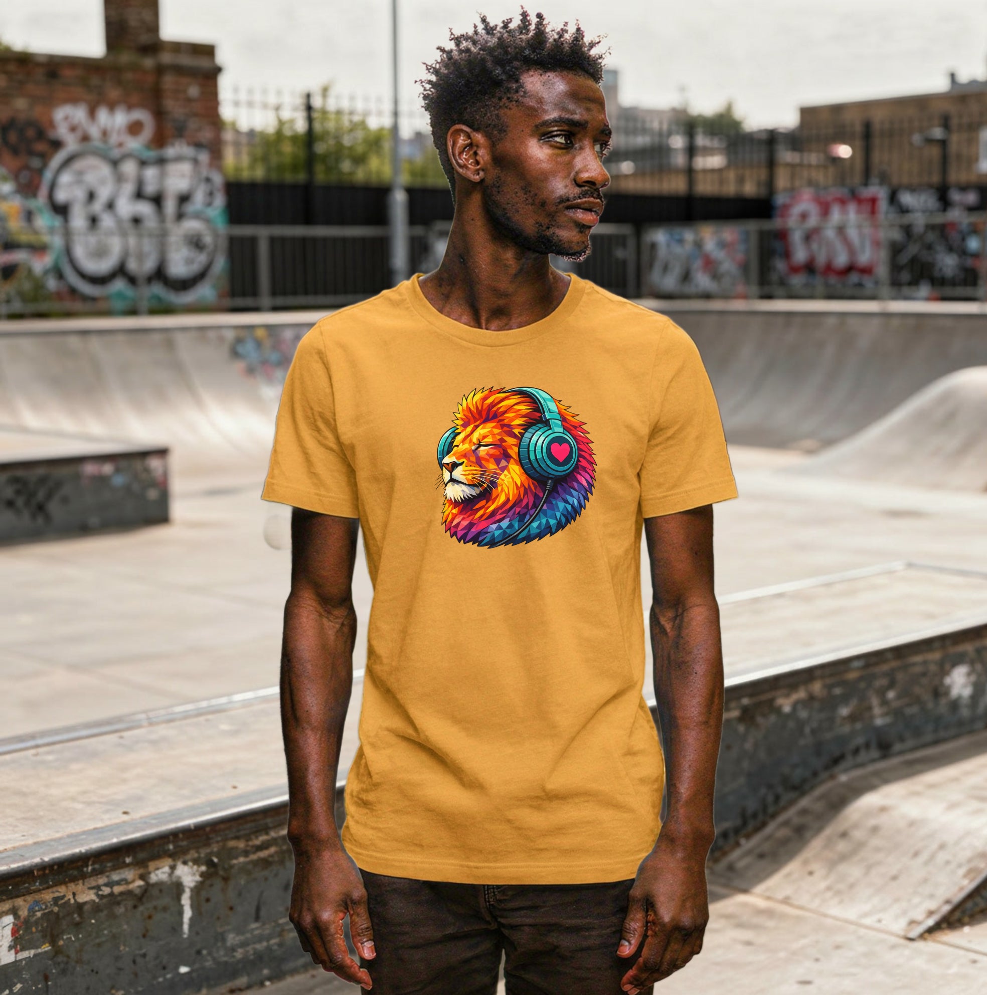 Person wearing a t-shirt with a colourful lion graphic, standing in a skateboard park