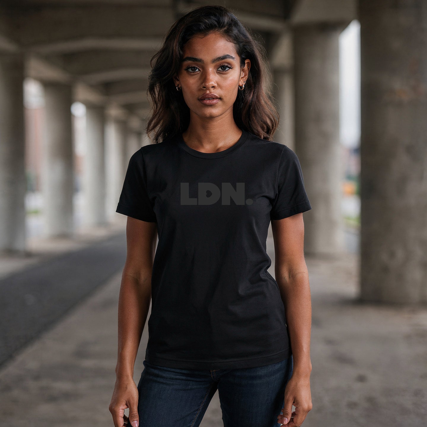 A t-shirt featuring a bold, minimalist design with LDN printed in large, dark letters across the chest. This unisex t-shirt offers a sleek and stylish way to show your London pride, perfect for casual wear or as a statement piece.