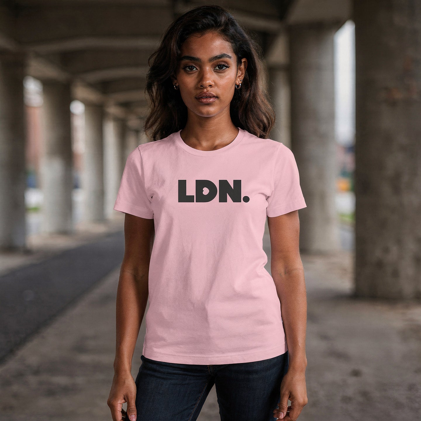 A t-shirt featuring a bold, minimalist design with LDN printed in large, dark letters across the chest. This unisex t-shirt offers a sleek and stylish way to show your London pride, perfect for casual wear or as a statement piece.