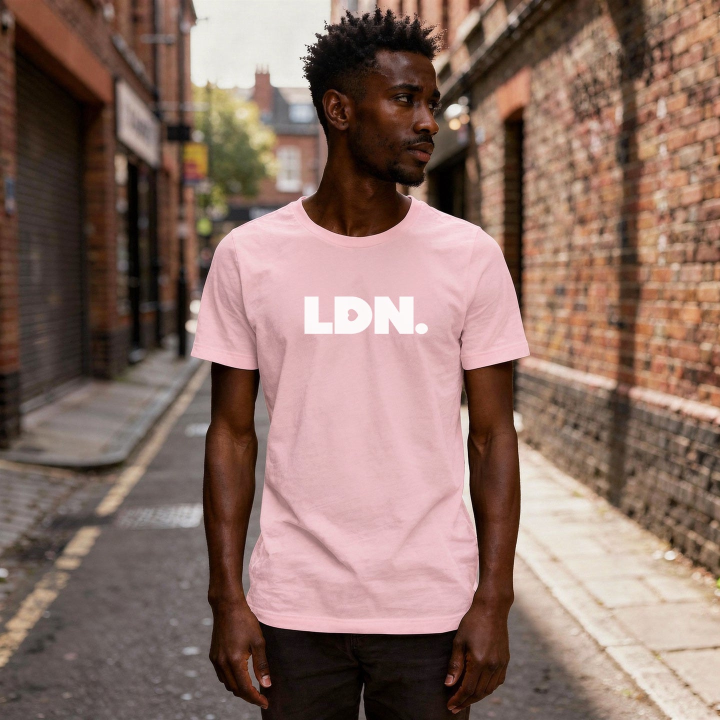 T-shirt featuring a bold, minimalist design with LDN printed in large, white letters across the chest. This unisex t-shirt offers a sleek and stylish way to show your London pride, perfect for casual wear or as a statement piece.