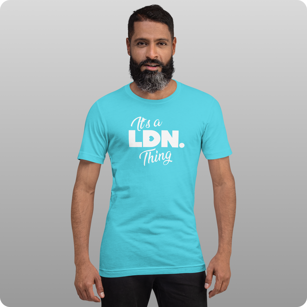 Man wearing a turquoise t-shirt with 'It's a LDN Thing' text on a gray background