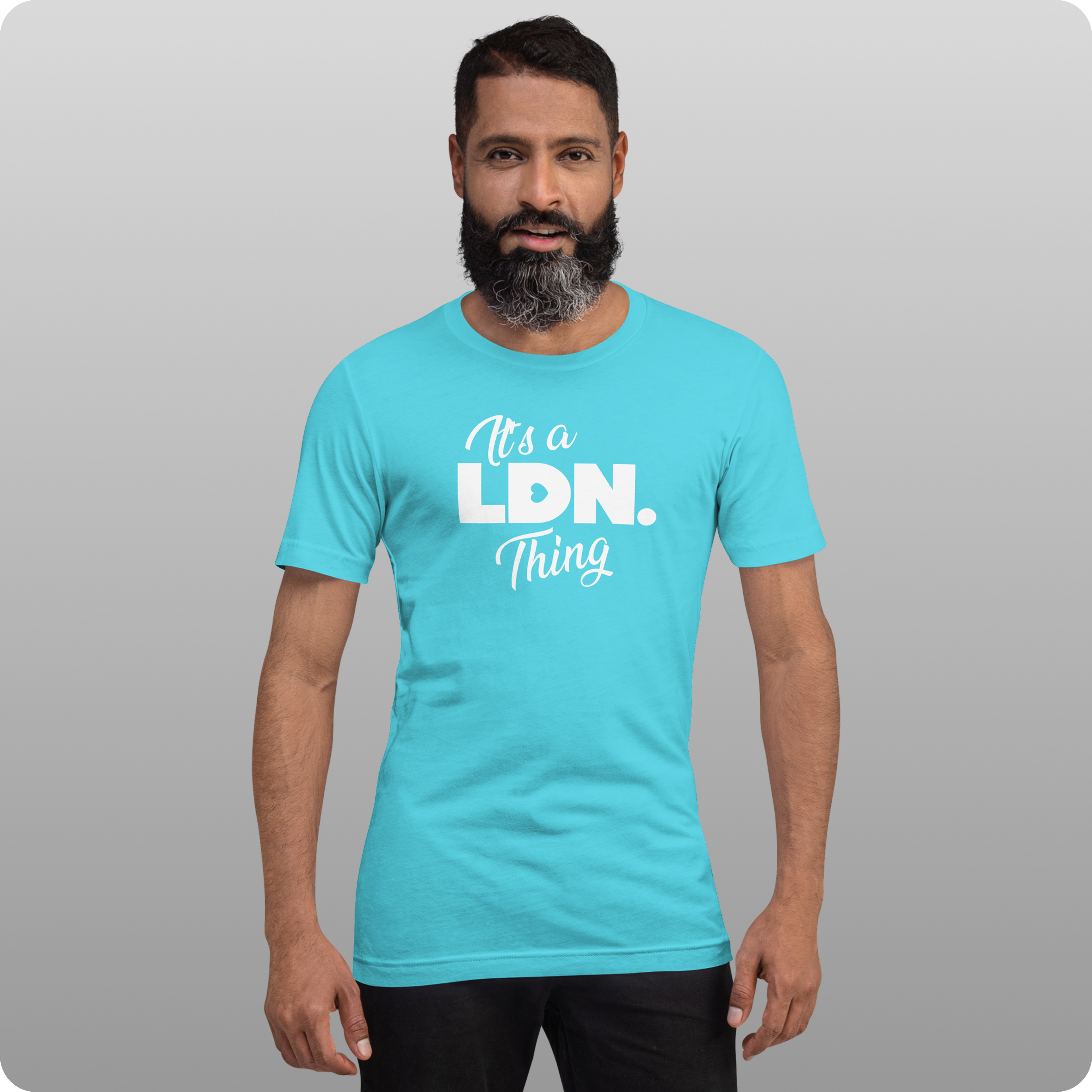 Man wearing a turquoise t-shirt with 'It's a LDN Thing' text on a gray background