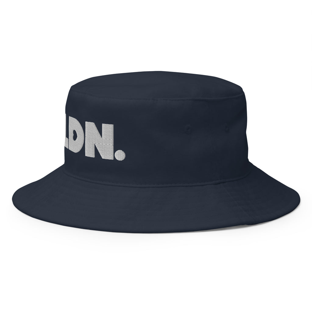 Bucket hat with bold embroidered LDN. logo on front. Features cotton twill fabric, breathable eyelets, and a relaxed wide brim. Ideal for everyday streetwear, summer outfits, or repping London in casual style.