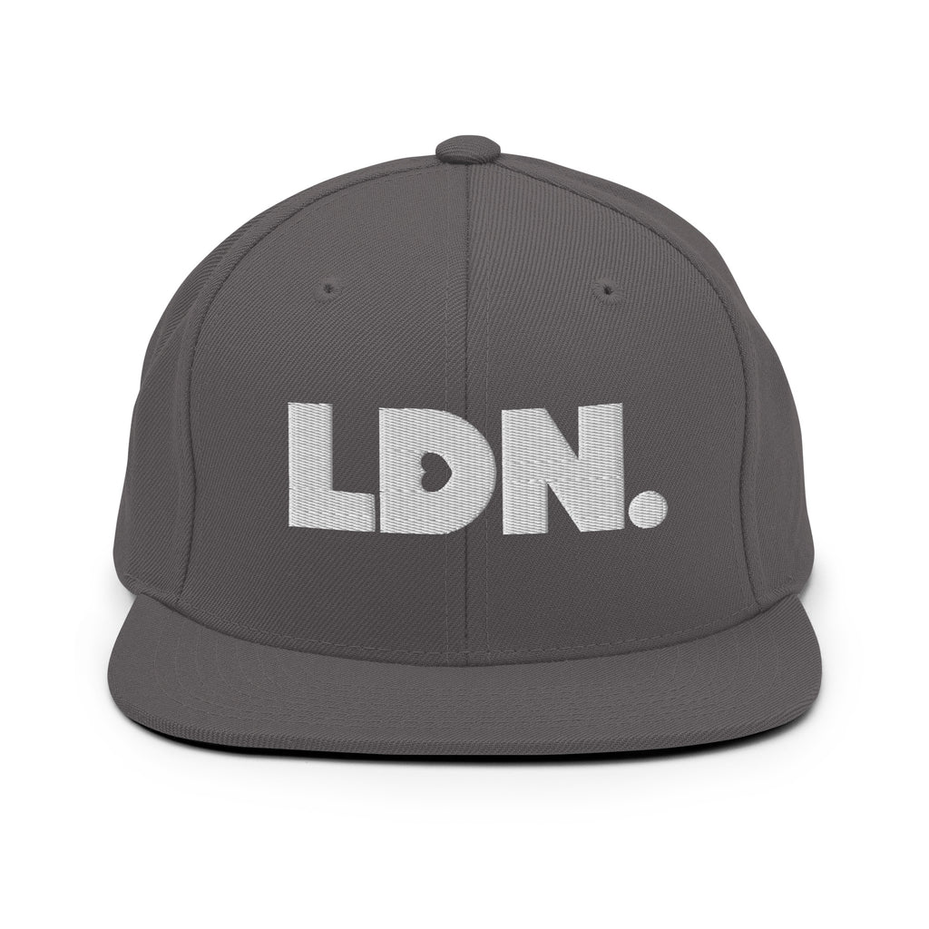 Black snapback hat featuring bold “LDN.” text in white — streetwear-ready with structured fit, flat brim, and adjustable back. A sharp urban essential for London lovers.