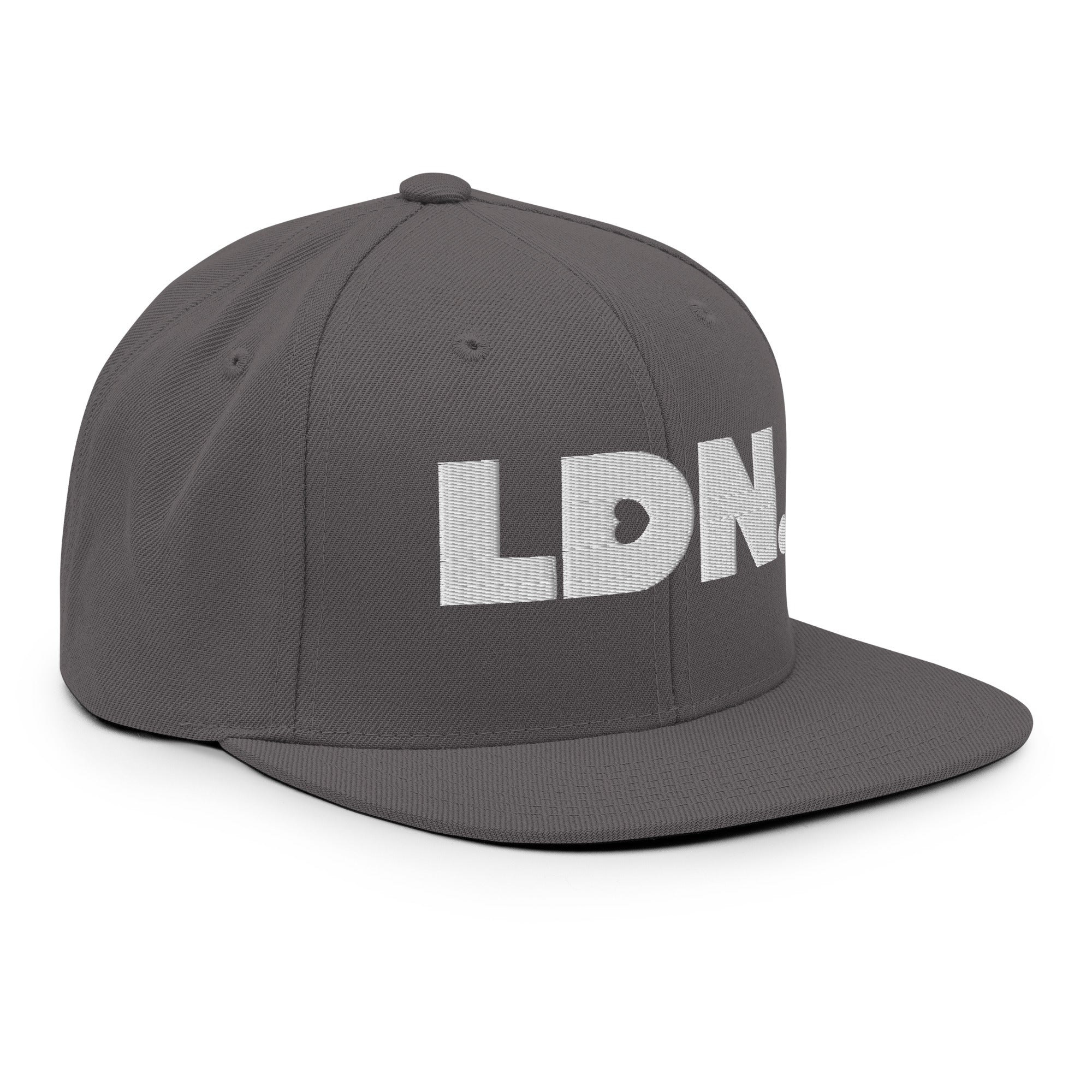 Black snapback hat featuring bold “LDN.” text in white — streetwear-ready with structured fit, flat brim, and adjustable back. A sharp urban essential for London lovers.