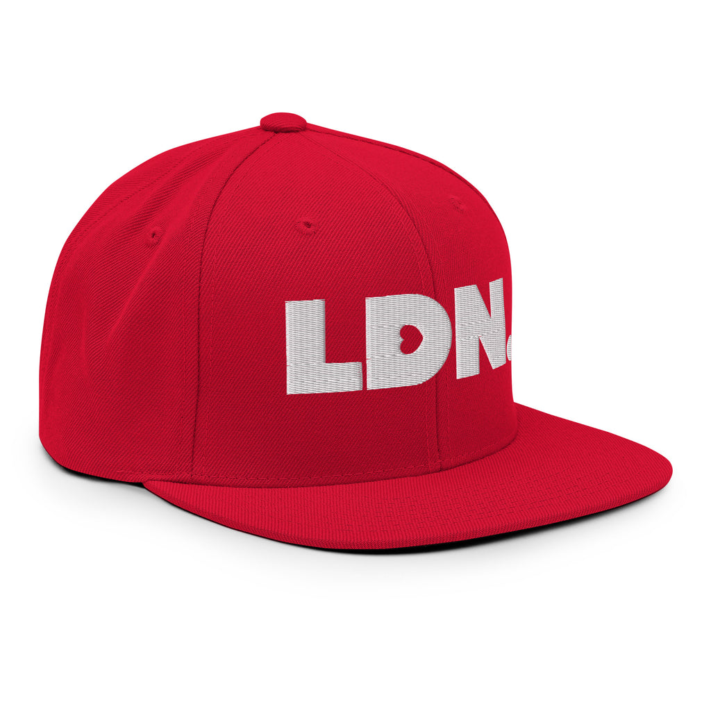 Black snapback hat featuring bold “LDN.” text in white — streetwear-ready with structured fit, flat brim, and adjustable back. A sharp urban essential for London lovers.