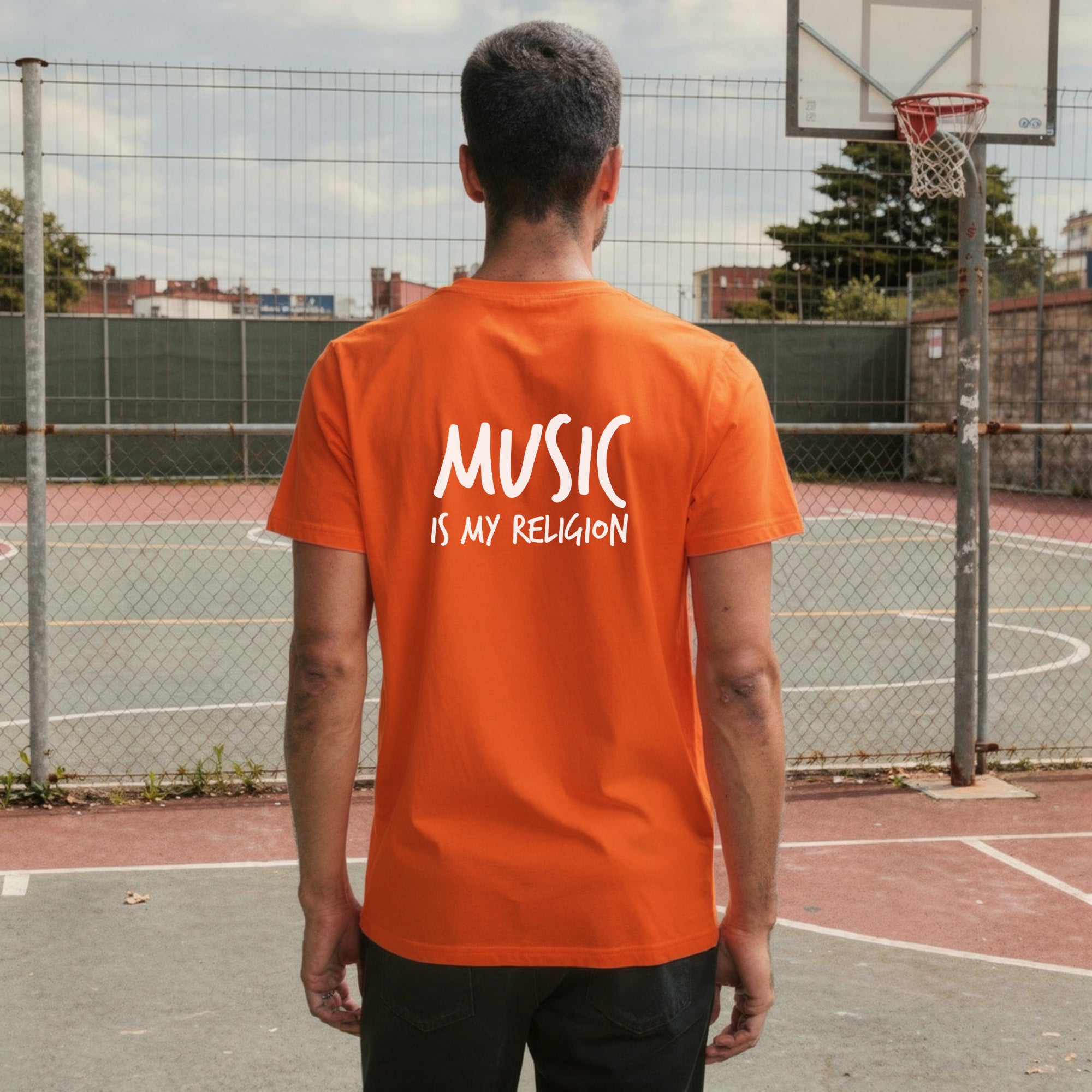 A bold "Music is My Religion" unisex t-shirt featuring a funky Jesus design in vibrant, geometric art. Made from 100% ring-spun cotton, this stylish shirt is perfect for music lovers, festival gear, and unique graphic tees that stand out.