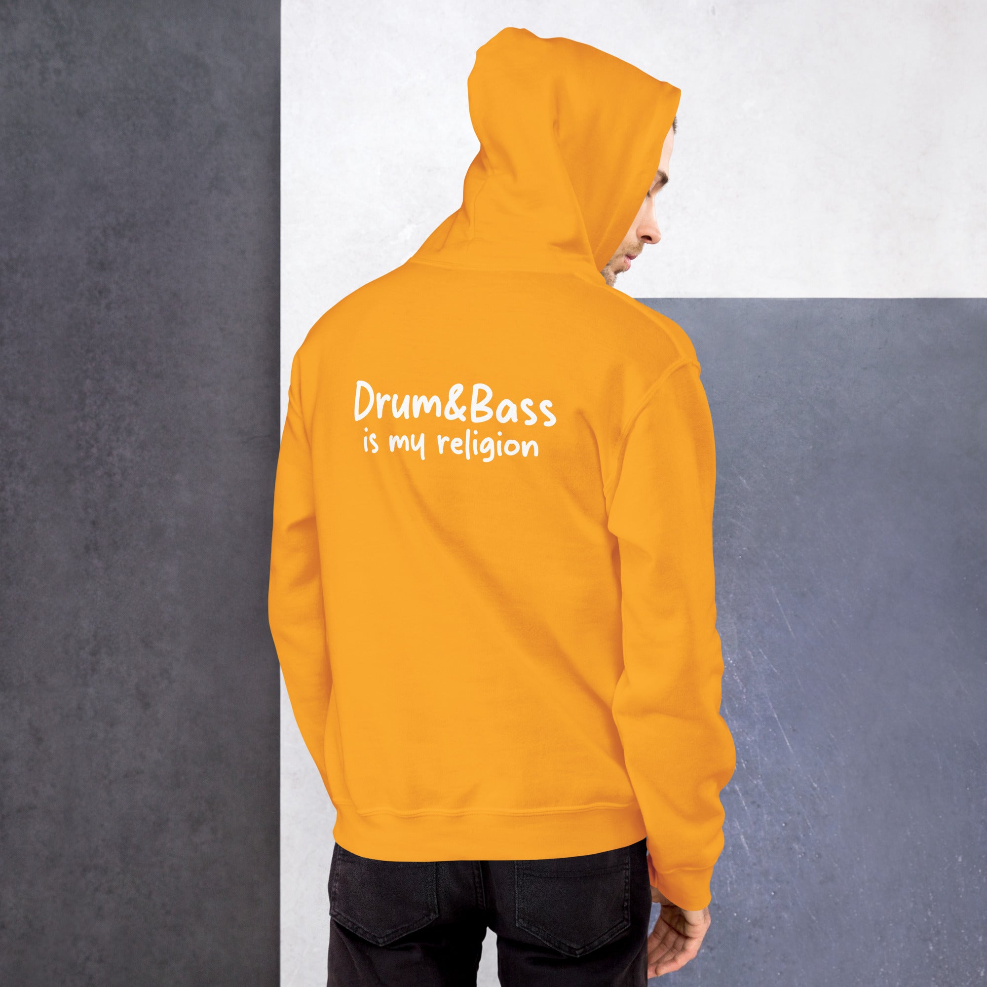 Unisex hoodie with bold, colourful geometric illustration of Funky Jaysus on front and “Drum&Bass is my religion” slogan on back. A statement streetwear piece for DnB lovers and festival culture.