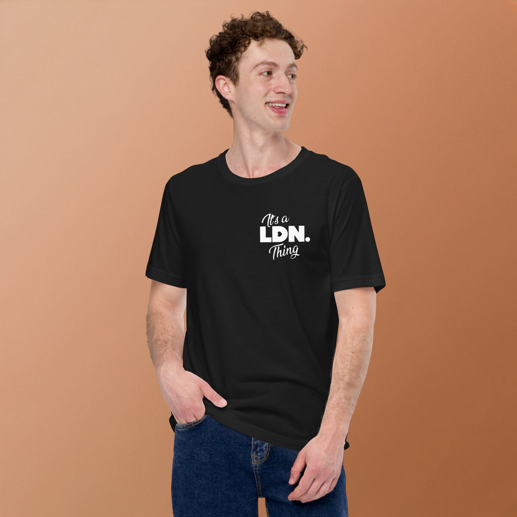 Man wearing a black t-shirt with 'It's a LDN Thing' text on a brown background