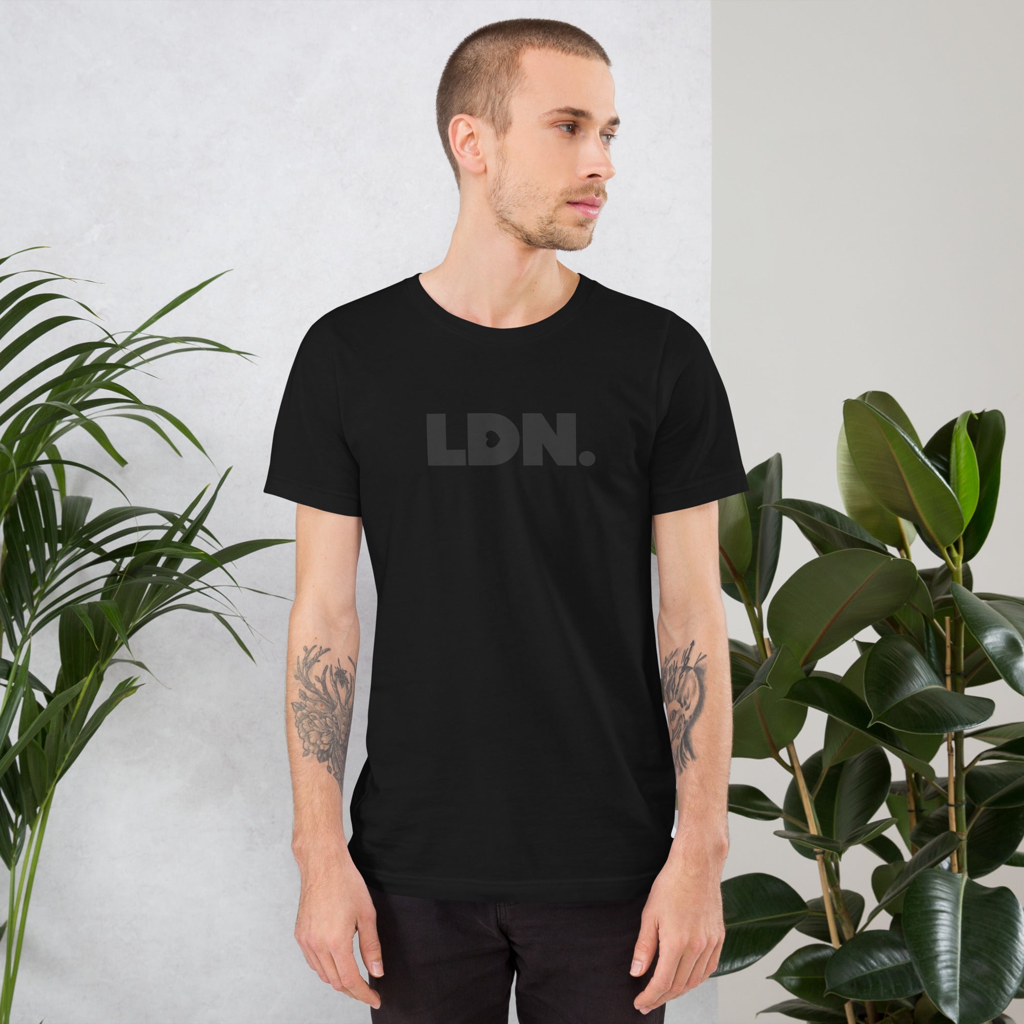 A black LDN t-shirt featuring a bold, minimalist design with LDN printed in large, dark letters across the chest. This unisex t-shirt offers a sleek and stylish way to show your London pride, perfect for casual wear or as a statement piece.